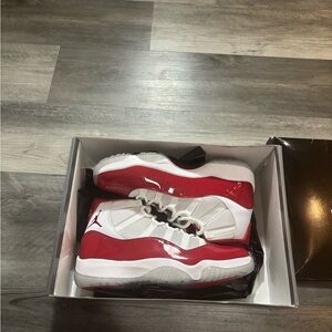 Jordan 11 Cherry Size 11.5 almost new.